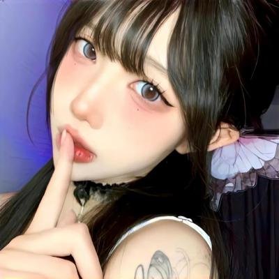 彼女